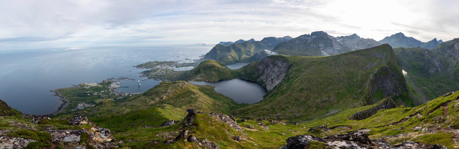 View from a ridge over a lake and the Norwegian coastline